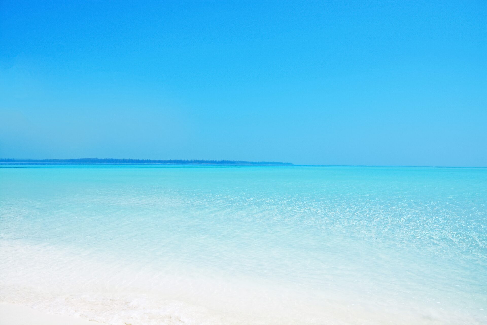 blue sea under blue sky during daytime